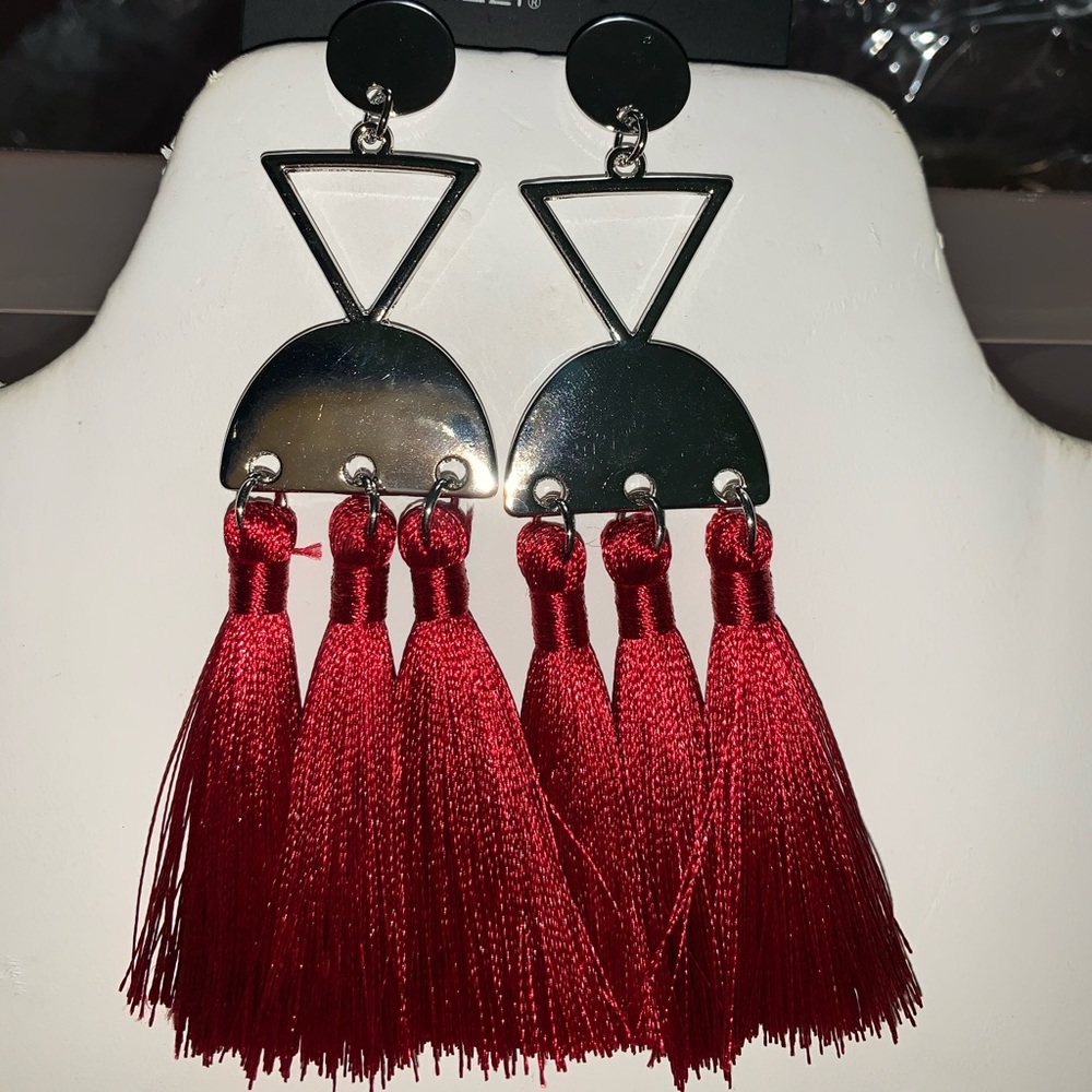 Beautiful red tassels with a silver setting